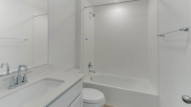 full bathroom with vanity, toilet, and bathtub / shower combination