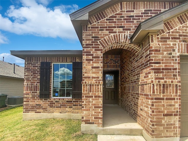 property entrance featuring central AC