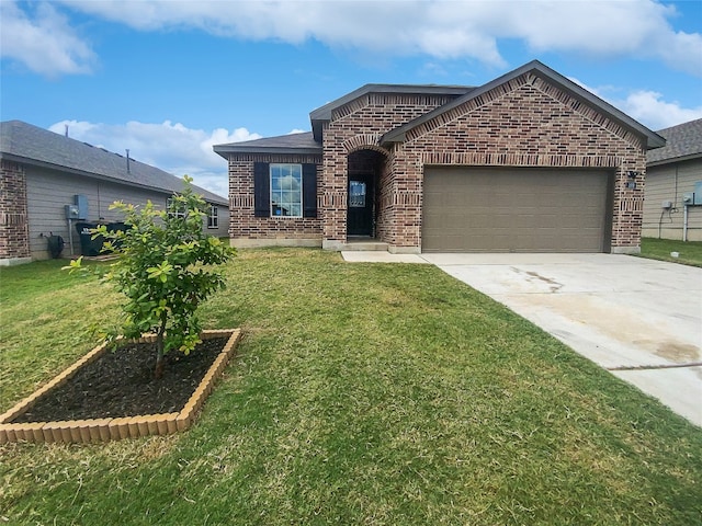 view of front of home featuring a garage and a front yard