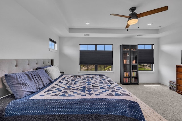 carpeted bedroom featuring ceiling fan