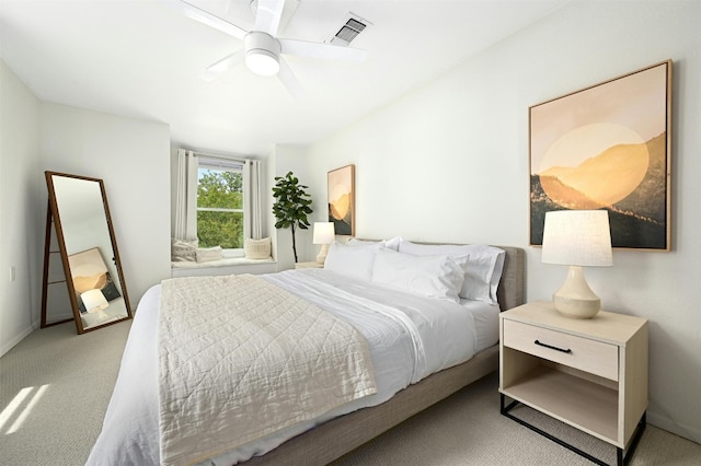 carpeted bedroom featuring ceiling fan