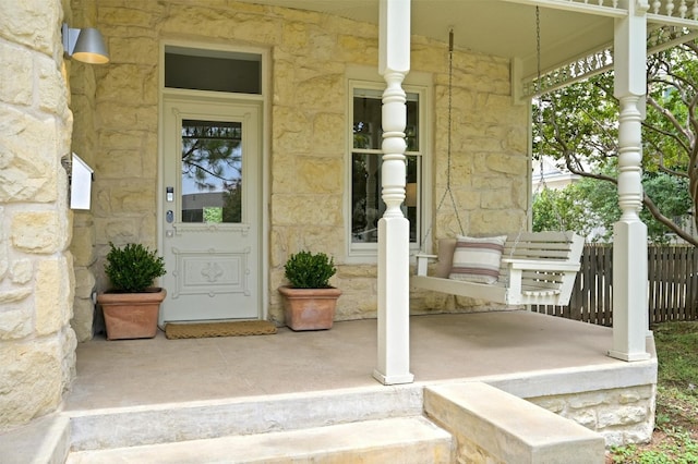 entrance to property with a porch