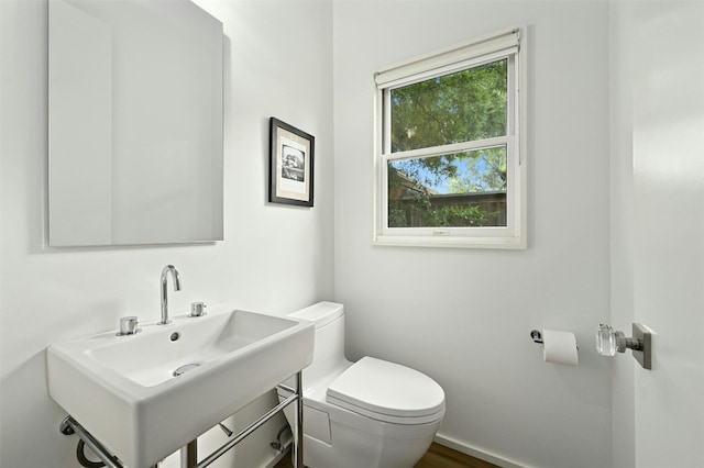 bathroom with sink and toilet