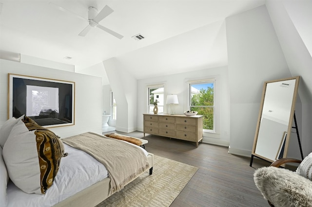 bedroom featuring vaulted ceiling, ceiling fan, and dark hardwood / wood-style flooring