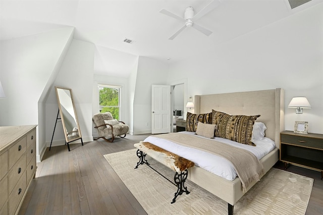 bedroom with ceiling fan and dark hardwood / wood-style floors