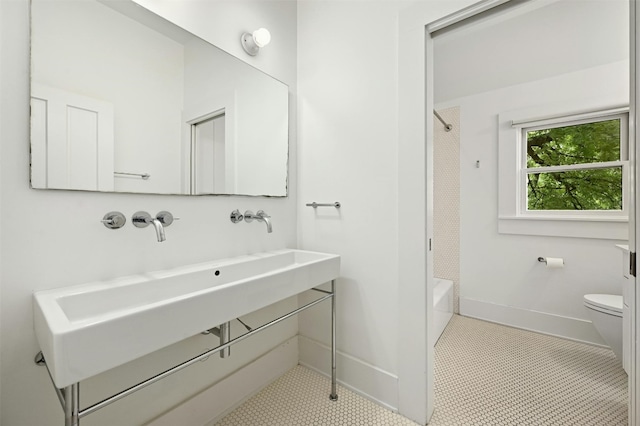 full bathroom with tile patterned floors, shower / bath combination, vanity, and toilet