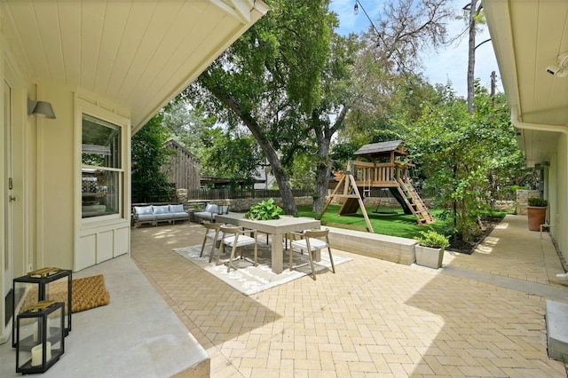 view of patio with a playground