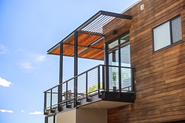 view of home's exterior featuring a balcony