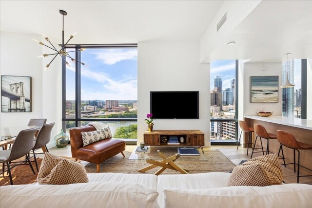 living room featuring a notable chandelier