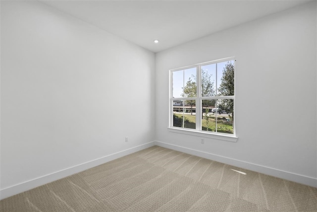 unfurnished room featuring carpet floors