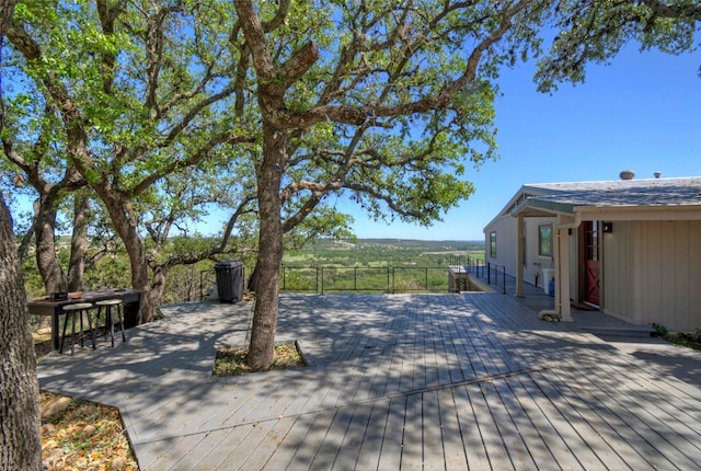 deck featuring a rural view