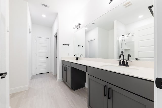 bathroom with vanity and walk in shower