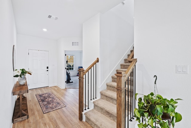 entrance foyer with light hardwood / wood-style floors