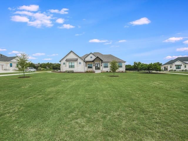 view of front of property with a front lawn