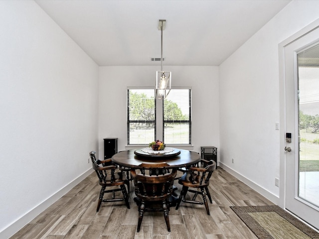 dining space featuring light hardwood / wood-style flooring