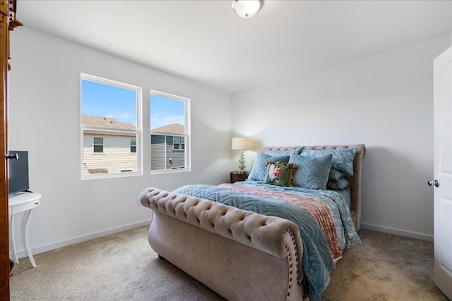 bedroom with light carpet