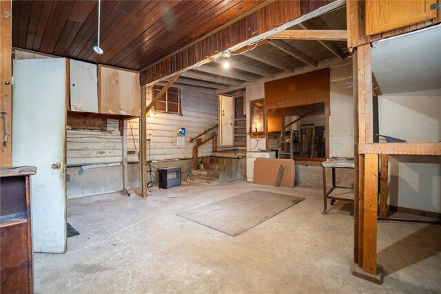 1816 Davis St, Taylor, TX 76574 - misc room featuring unfinished concrete floors and stairway