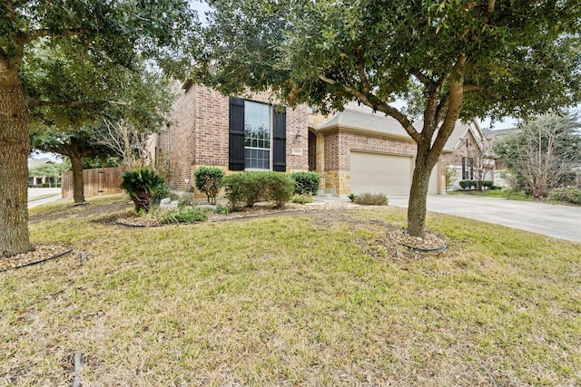 view of front facade featuring a garage and a front lawn