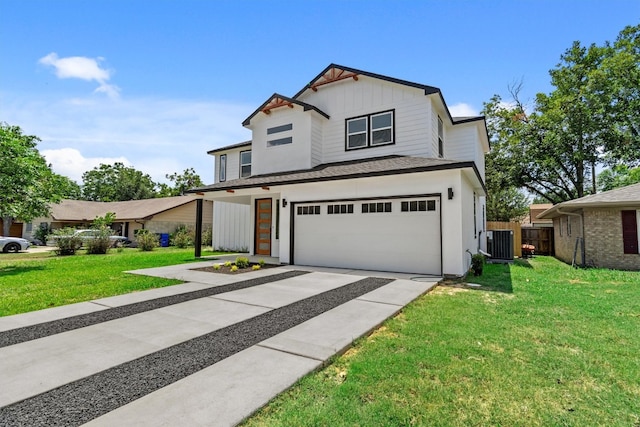 view of front of house with a garage, a front yard, and central air condition unit