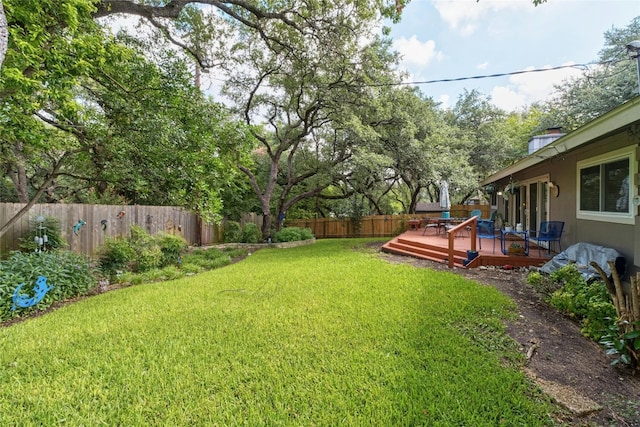 7110 Sungate Dr, Austin, TX 78731 - view of yard featuring a fenced backyard and a deck