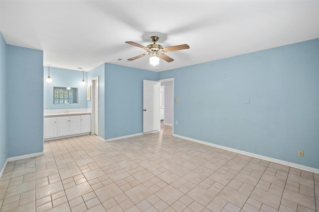 7110 Sungate Dr, Austin, TX 78731 - interior space with baseboards, ceiling fan, and ensuite bath