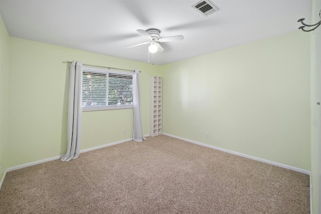7110 Sungate Dr, Austin, TX 78731 - carpeted empty room with baseboards, ceiling fan, and visible vents