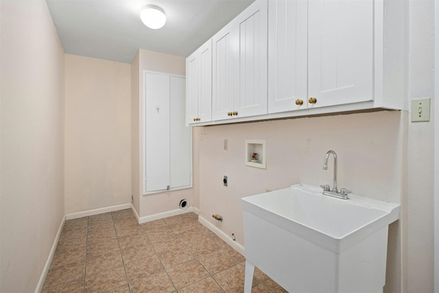 laundry area with cabinets, sink, electric dryer hookup, hookup for a gas dryer, and hookup for a washing machine