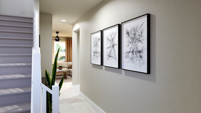 hall featuring light tile patterned floors