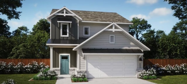 craftsman house featuring a garage and a front yard