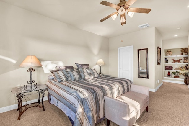 bedroom with light carpet and ceiling fan