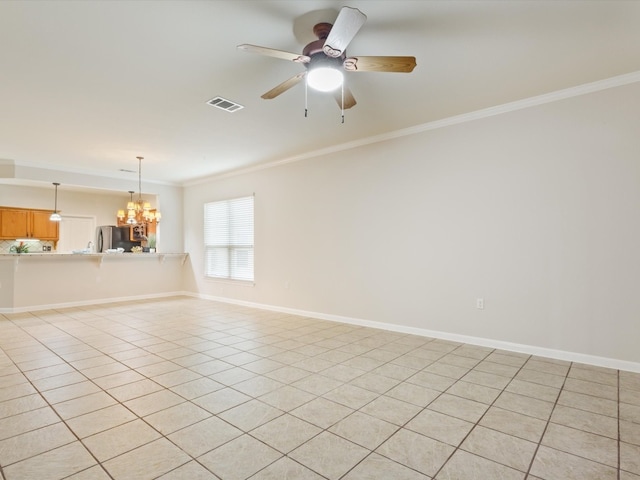 unfurnished room with light tile patterned floors, crown molding, and ceiling fan with notable chandelier