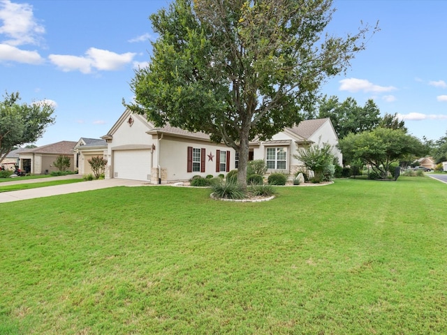 ranch-style home with a garage and a front lawn