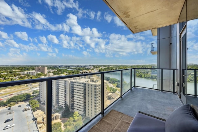 44 E Ave Unit 1709, Austin, TX 78701 - balcony featuring a city view and a water view