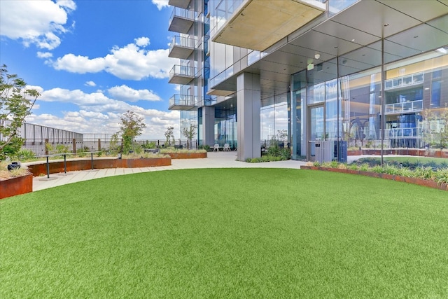 view of community featuring a lawn