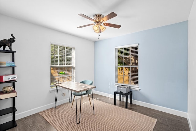 office area featuring ceiling fan and dark hardwood / wood-style flooring