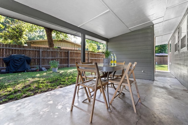 view of patio with a grill