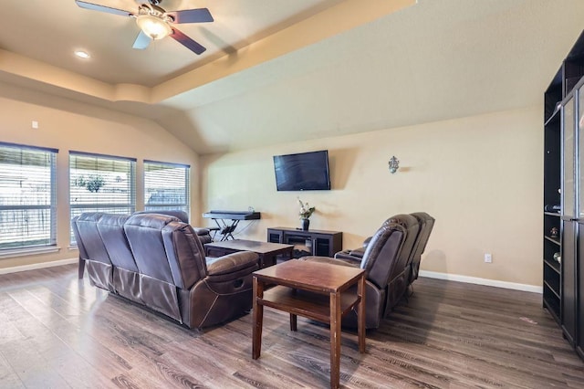206 Swenson Dr, Hutto, TX 78634 - living room with dark wood-style flooring, a ceiling fan, recessed lighting, and a raised ceiling