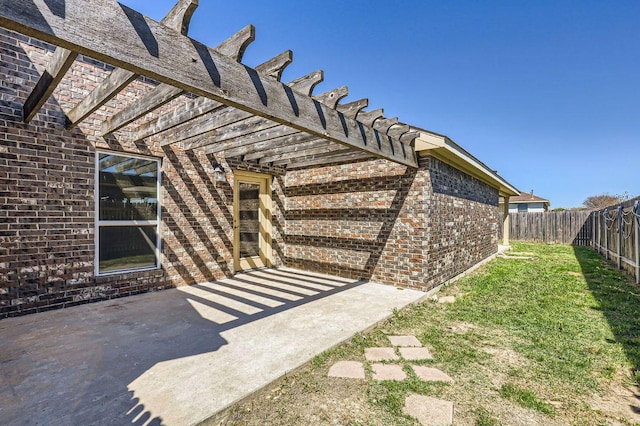 206 Swenson Dr, Hutto, TX 78634 - fenced backyard featuring a pergola and a patio area