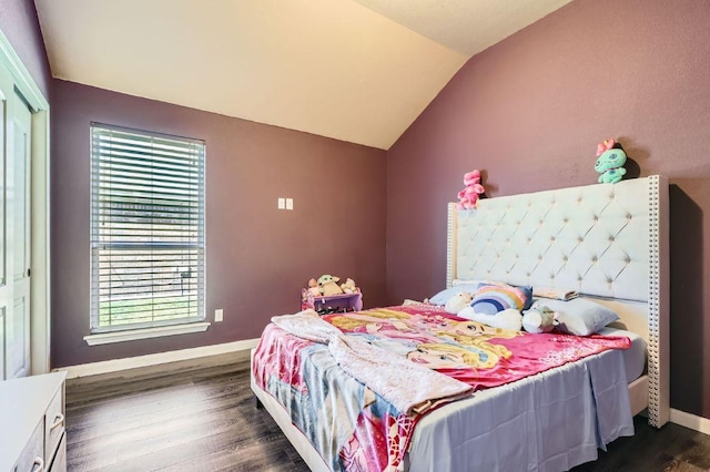 206 Swenson Dr, Hutto, TX 78634 - bedroom with vaulted ceiling and dark wood finished floors