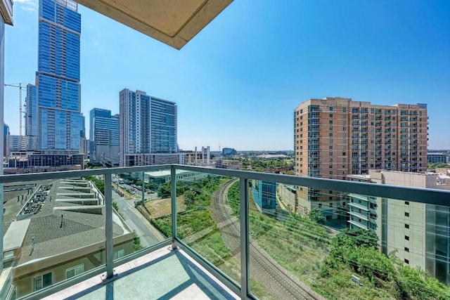 balcony featuring a city view