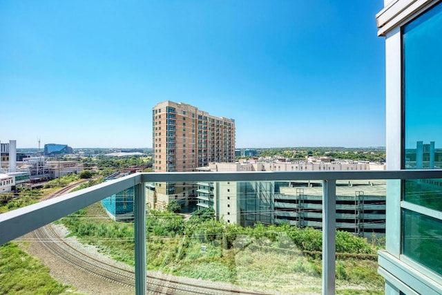 balcony featuring a city view