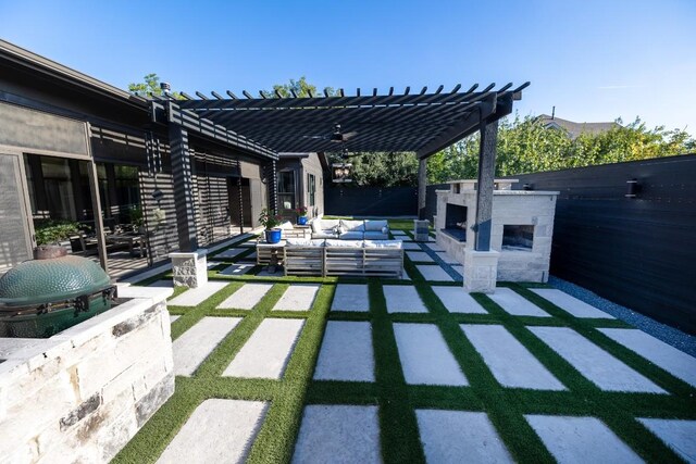 view of patio with outdoor lounge area and a pergola