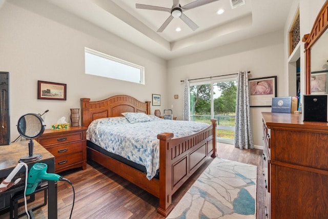 103 Hans Bell Dr, Blanco, TX 78606 - bedroom with access to outside, wood finished floors, a raised ceiling, recessed lighting, and ceiling fan