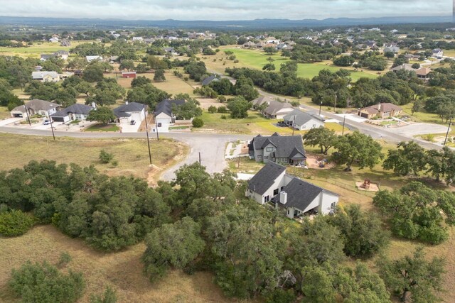 103 Hans Bell Dr, Blanco, TX 78606 - aerial overview of property's location with nearby suburban area