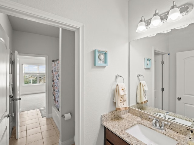 bathroom featuring vanity, tile patterned floors, and shower / bath combination with curtain