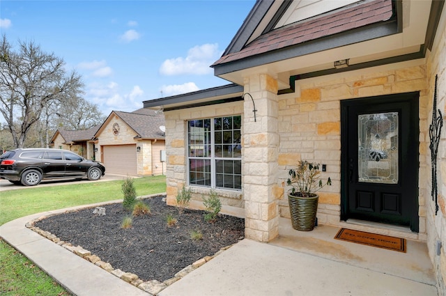 entrance to property featuring a garage