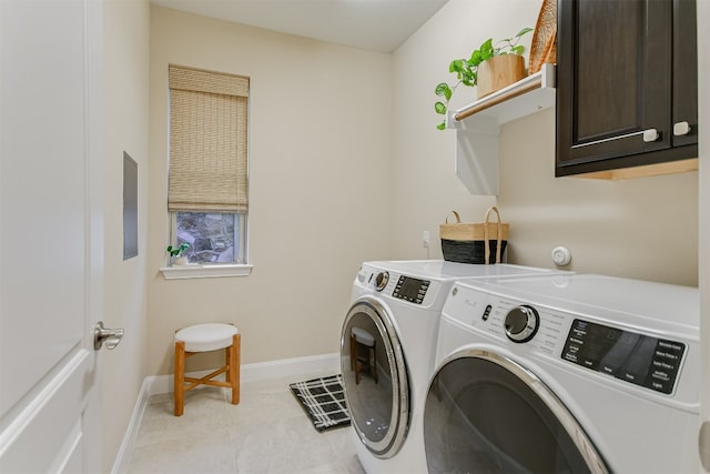 203 Maxwell Way, Austin, TX 78738 - laundry area featuring washing machine and clothes dryer, cabinet space, and light tile patterned floors