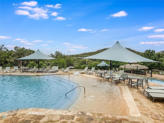 203 Maxwell Way, Austin, TX 78738 - community pool with a patio