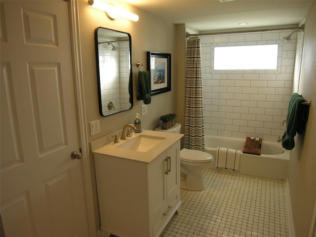 full bathroom featuring vanity, toilet, shower / tub combo with curtain, and tile patterned floors