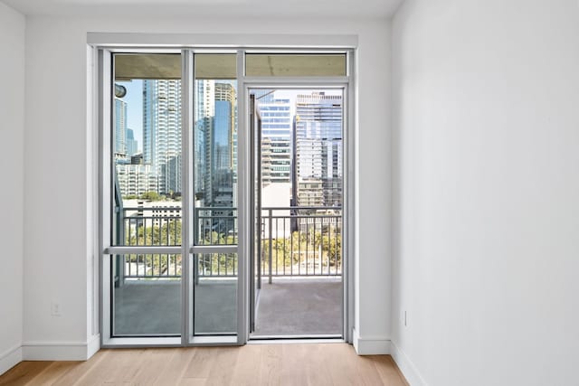 doorway to outside featuring light hardwood / wood-style flooring